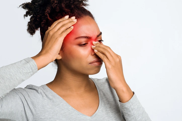 woman with headache and sinus